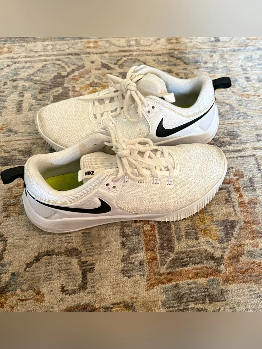 Nike women’s White Athletic Sneakers with Black Swoosh and Neon Green Lining